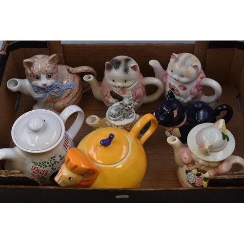 278 - Eight cat themed novelty tea pots