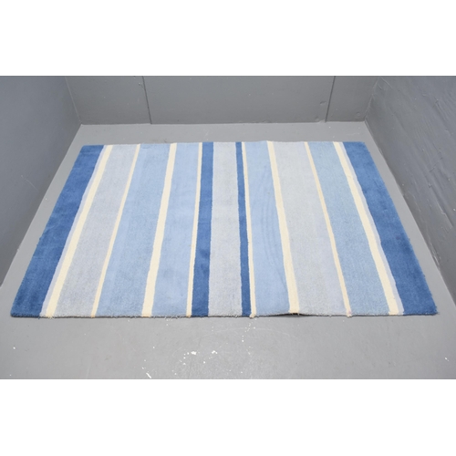 681 - Blue and white striped rug (70