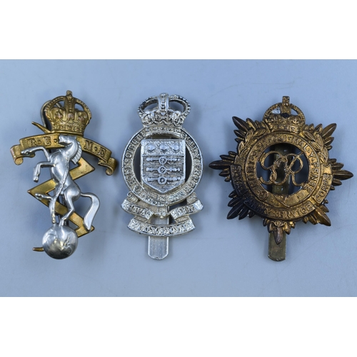 274 - Three Military Badges including REME, Royal Army Service Core and Royal Army Ordnance Core