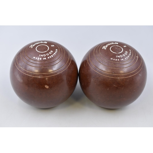 308 - Two wooden Henselite indoor bowling bowls made in Australia