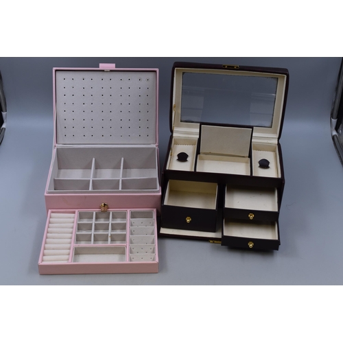 437 - Two Jewellery Boxes To Include Faux Pink Leather, And Other