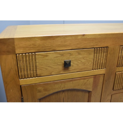 592 - Large Heavy Oak Doorway to Value Side board with Four Drawers and Three Cupboards Approx.62 inch x 3... 