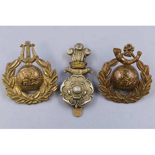 180 - Three Military Badges including Royal Marine Light Infantry, Royal Naval School of Music and Alexand... 