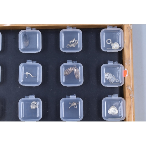 69 - Selection of 30 Mixed Silver Charms individually Packaged