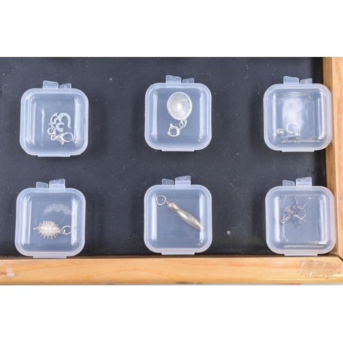 69 - Selection of 30 Mixed Silver Charms individually Packaged