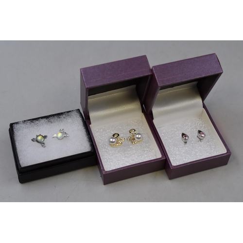 78 - Three Pairs of Silver Earrings in Boxes to include Angel and Devil