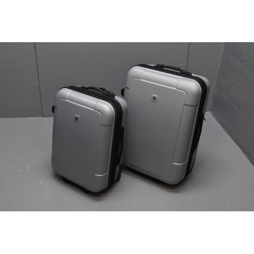 368 - Two Matching Fiore Hard Bodied Pull Along Suitcases (Largest 26