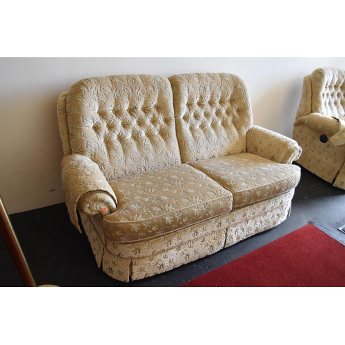 584 - Two seater sofa with floral design and two electric recliner chairs (very heavy) Chairs seemed to fu... 