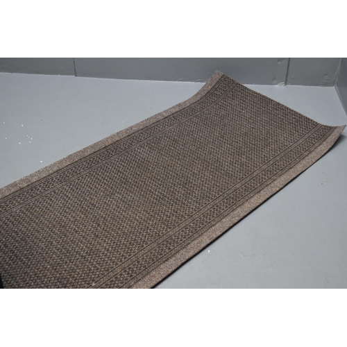 598 - Long dark coloured carpet runner (118