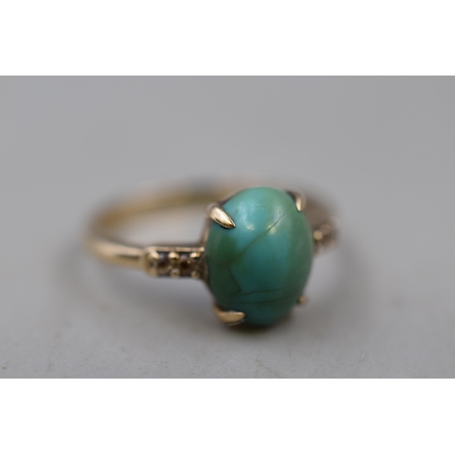 7 - Gold 375 (9ct) Diamond and Turquoise Stone Ring (Size O) Complete with Presentation Box