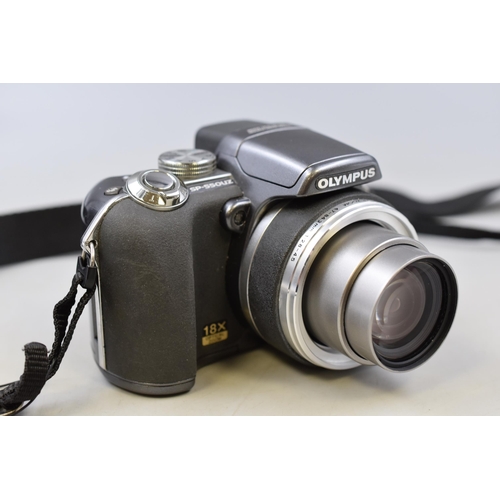 354 - Olympus SP-550UZ Digital Camera works off (AA batteries)complete with Lens Cover and Olympus Storage... 