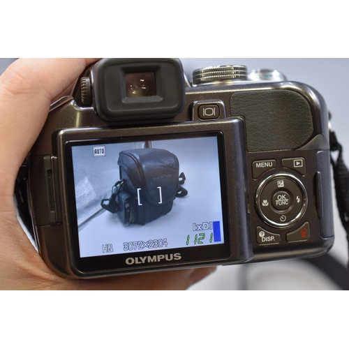 354 - Olympus SP-550UZ Digital Camera works off (AA batteries)complete with Lens Cover and Olympus Storage... 