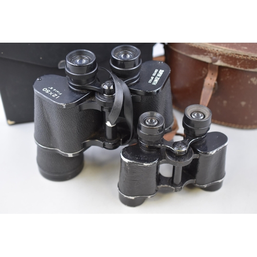 209 - Pair of 8 x 20 Military Binoculars with Case and a Pair of Super Zenith 12 x 50 Binoculars with Case