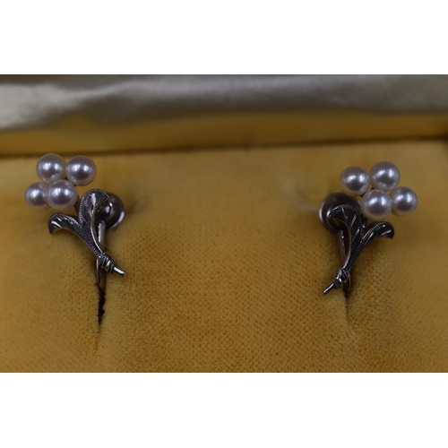 74 - A Pair of Vintage Mikimoto Cultured Pearl and Sterling Silver Screw Back Earrings, In Presentation B... 