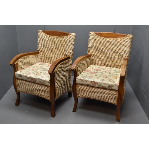 488 - Two wood and wicker chairs with cushions (37