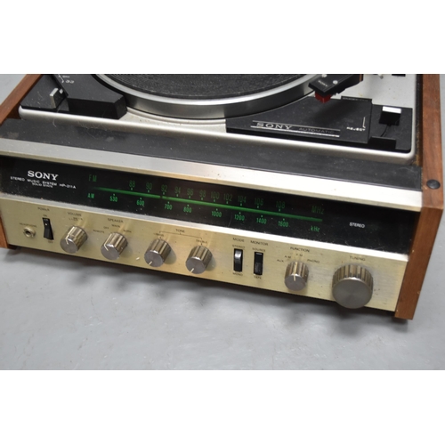 474 - Sony HP-211A Stereo Music System all powers on and Turntable seems to Function Correctly comes compl... 