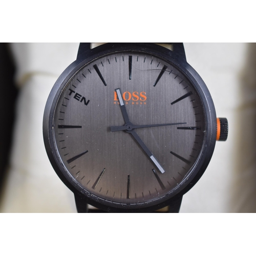 118 - A Gents Hugo Boss Black With Orange Accents Quartz Watch, In Presentation Box