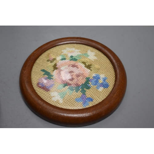 598 - Six embroidered pictures 4 of them are of flowers one has broken glass picture frame and 1 is of a c... 