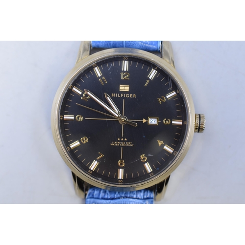 144 - A Tommy Hilfiger Gents Designer Day/Time Watch (TH.202.1.34.1377) With Blue Leather Strap. Working