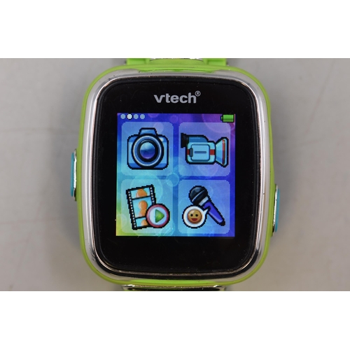 150 - A Vtech DX2 Childs Smart Watch With Green Rubberised Strap, Powers On When Tested