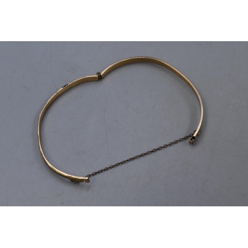 23 - Etched Bangle with Safety Chain - Marked 50 Micron 9ct RG