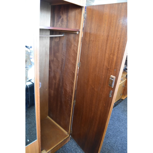 501 - Vintage teak double wardrobe with mirror strip in between the doors (68