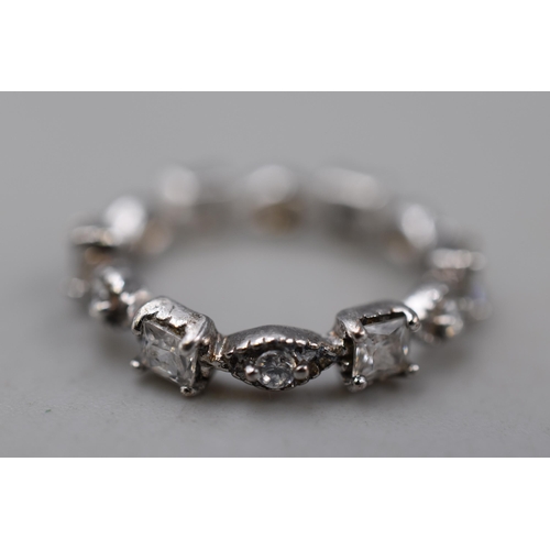 53 - A 925. Silver Clear Stoned Eternity Ring, Size N. In Presentation Box