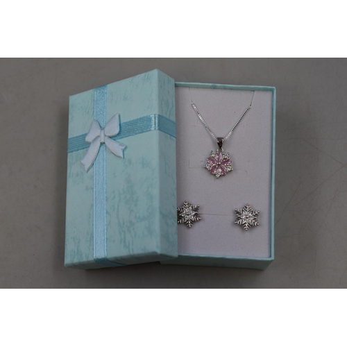 59 - A Pair of 925. Silver Clear Stoned Snowflake Earrings, With Pink and Clear Stoned Snowflake Pendant ... 