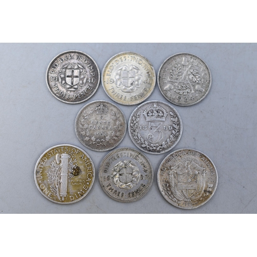 145 - Eight English and Foreign Silver Coins