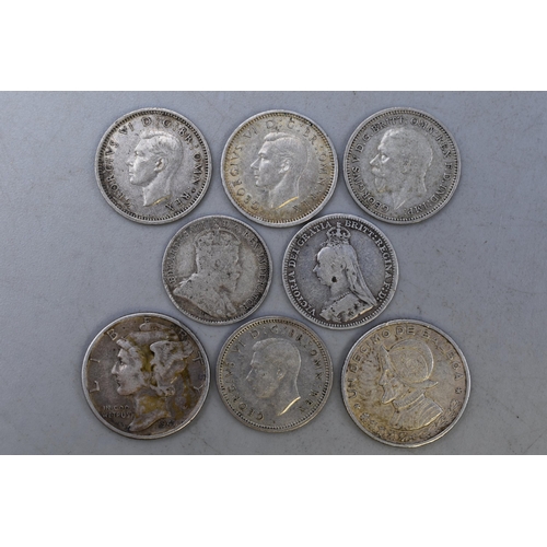 145 - Eight English and Foreign Silver Coins