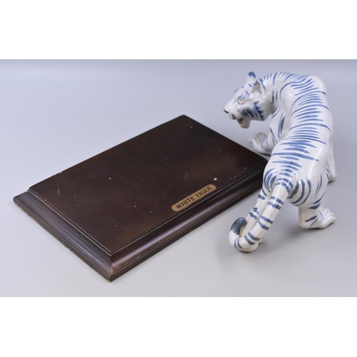 172 - A Blue and White Chinese 'White Tiger' Figure, On Wooden Plinth. Approx 12