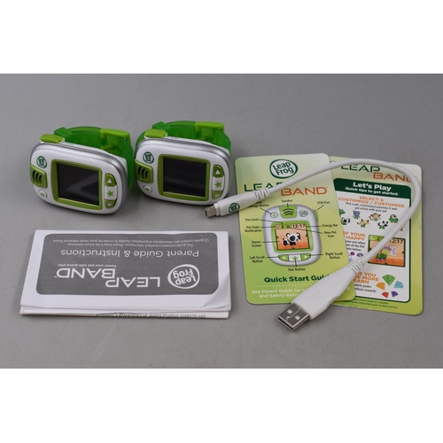 113 - Two Working Leapfrog Childrens Activity Watches, With Charging Lead. One Powers On When Tested