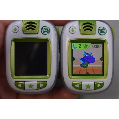 113 - Two Working Leapfrog Childrens Activity Watches, With Charging Lead. One Powers On When Tested