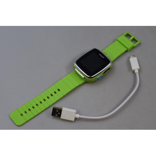 115 - A Vtech DX2 Childs Smart Watch With Green Rubberised Strap, Powers On When Tested