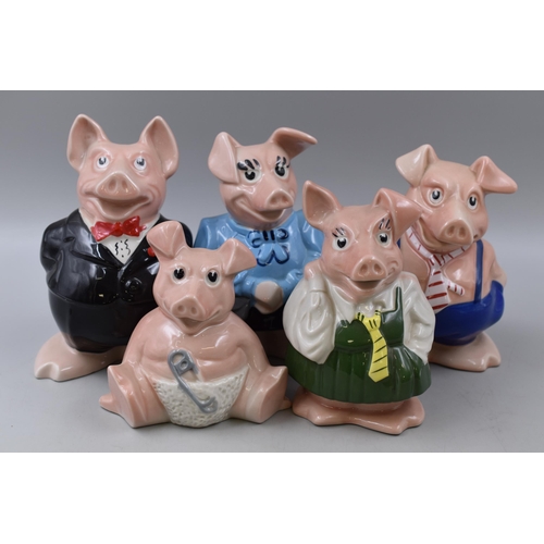 125 - A Set of Five Wade Nat West Piggy Banks With Stoppers