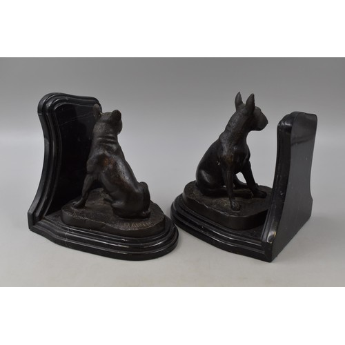 174 - A pair of bronze bookends on marble bases depicting English bull terriers signed BARIE