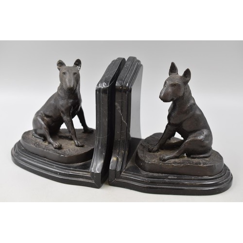 174 - A pair of bronze bookends on marble bases depicting English bull terriers signed BARIE