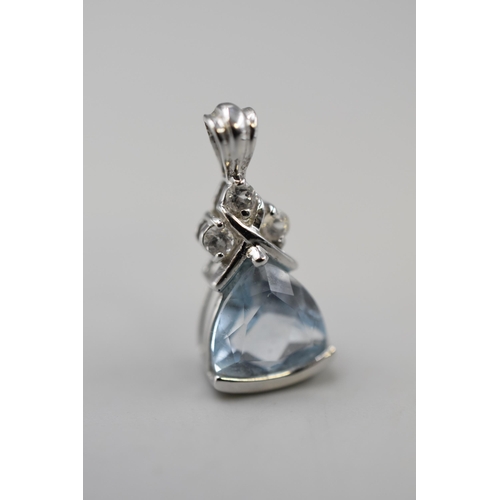 18 - White Gold 9ct Sky Blue & White Topaz Pendant Complete with Certificate of Authenticity