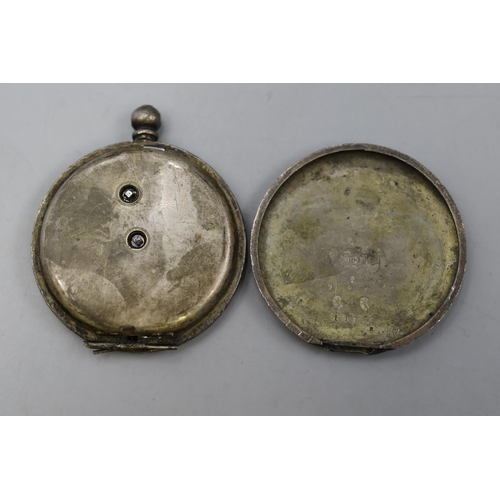 31 - A .955 Silver Cased Embossed Pocket Watch, Spares or Repairs