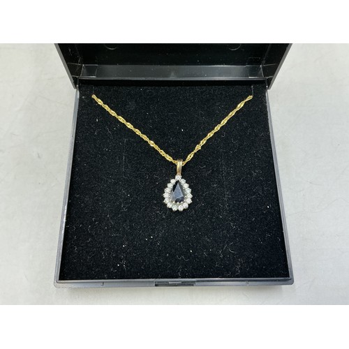 15 - Hallmarked 375 (9ct) Sapphire Pendant Necklace Complete with Presentation Box