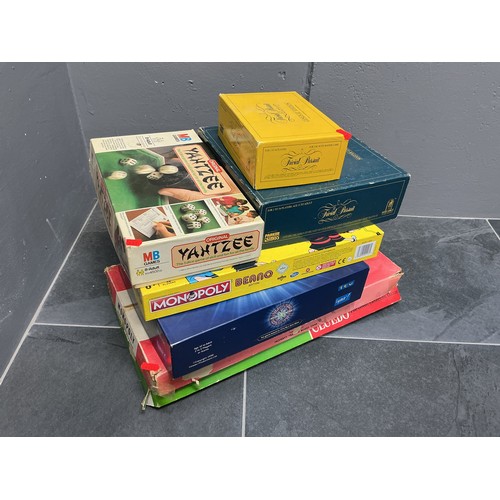 Selection of table top games to include Trivial pursuits + Genus II edition, Monopoly Traditional & Beano edition, Who wants to be a millionaire and Cluedo