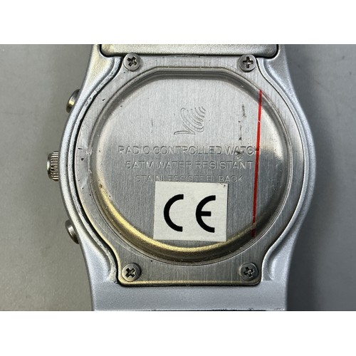 37 - A Klik Gents Quartz Radio Controlled Watch - White Light Up Dial, With Black Leather Strap. Working