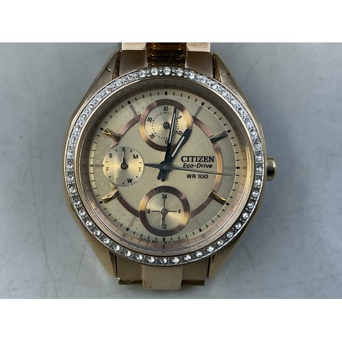 44 - A Ladies Citizen Eco Drive (FD1063-57X) Watch - Gold Tone Accented Dial, Clear Stoned Bezel, And Gol... 