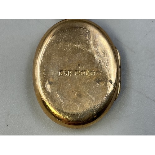 13 - A Hallmarked 9ct Gold Etched Locket Pendant