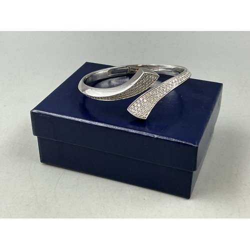 24 - Hallmarked 18ct White Gold Hinged Back Cross Over Hoop Bangle Set with 2.93cts of Diamonds come comp... 