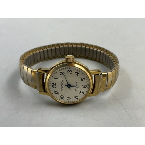 A Ladies Sekonda 17 Jewels Mechanical Watch - Textured Dial, Gold Tone Case and Strap. Working