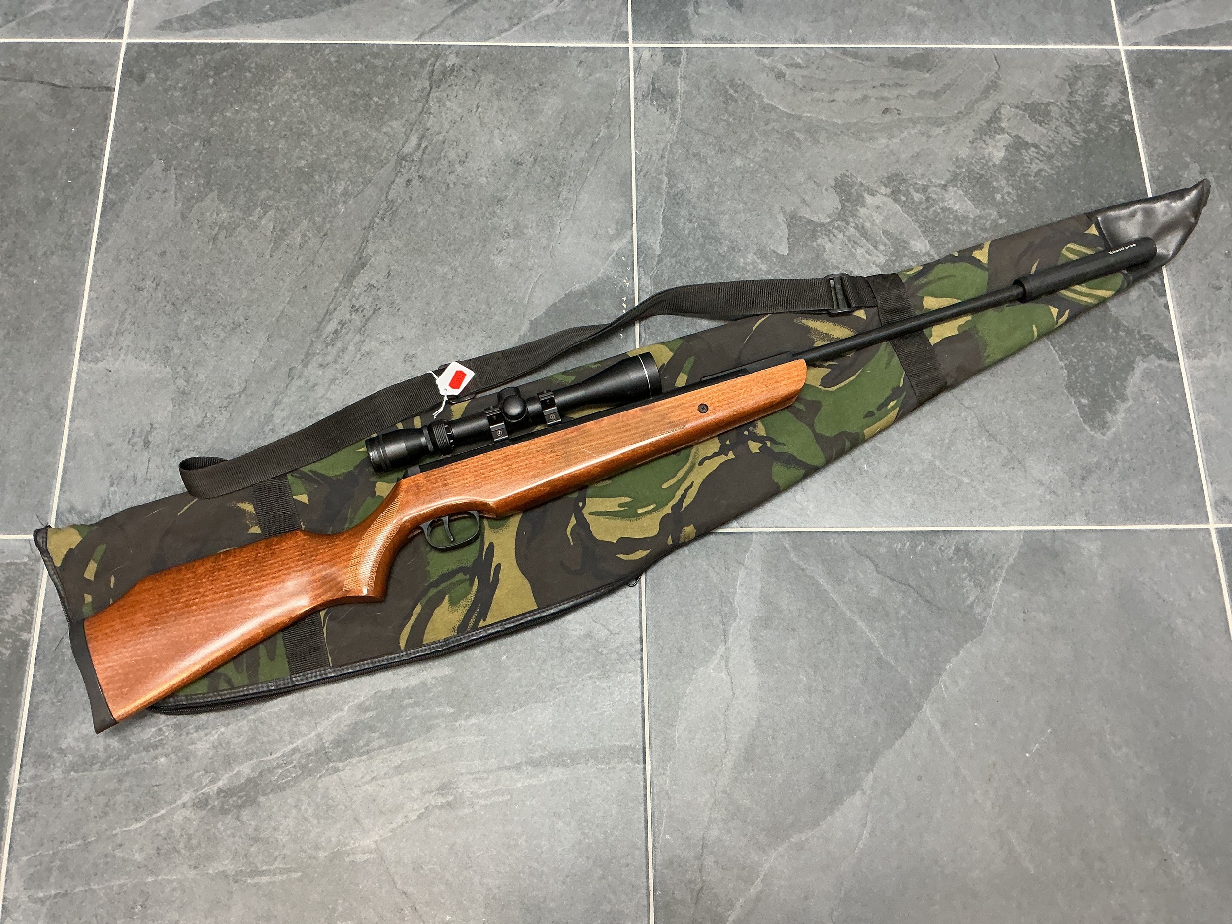 A .22 Cal Break Barrel Air Rifle, With Silent Force Suppressor, 3-9x40 ...