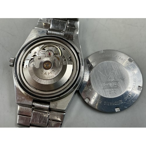 105 - A Gents Camy 25 Jewels Automatic Day/Date Watch - Unusual Purple Dial, Stainless Steel Case and Stra... 