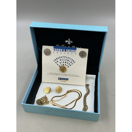 81 - Six Cruise Related Crown & Anchor Pin Badges and A Pair of Cufflinks, Two Necklace Chains (One 1... 