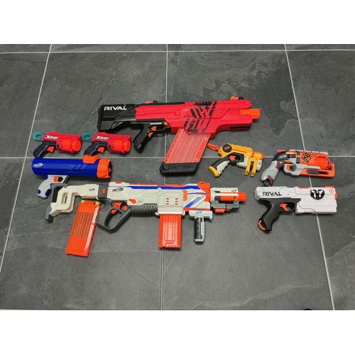 12 - Six Nerf Guns (With Two Others), And A Selection of Ammo. Untested